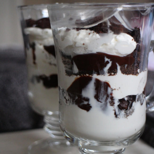 moody creamy cheesecake parfait with bailey’s chocolate sauce.